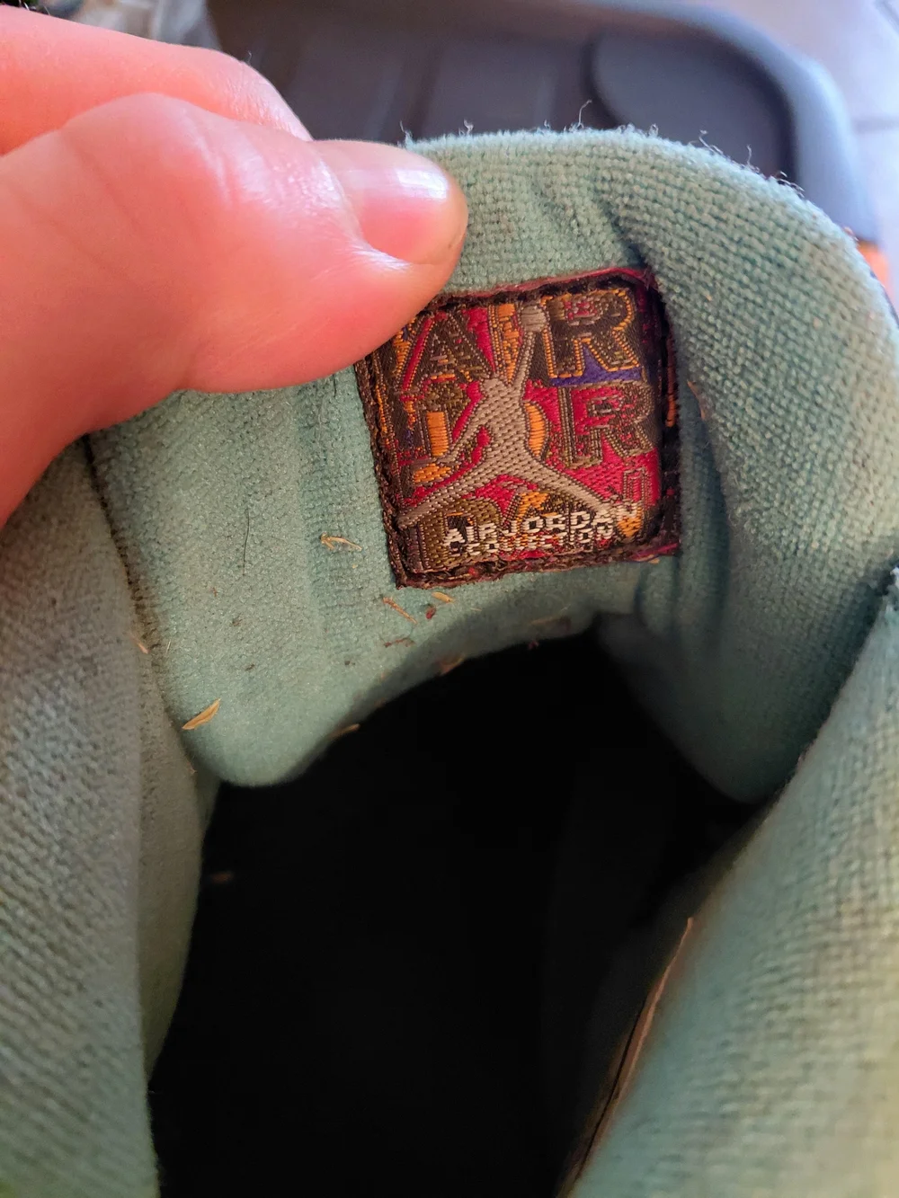 Jordan Teal and Black High-Top Sneaker Interior